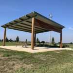 Park picnic skillion shelter on concrete slab with timber slats and trim