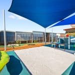 Large inground sandpit with accessible elevated sand table