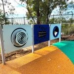 multiple sensory panels installed in tandem in varying shades of blue