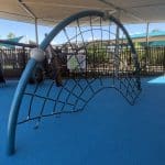 Blue arch with cable net webbing down to the ground