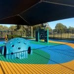 Blue domed play climber in rubber wetpour surfacing